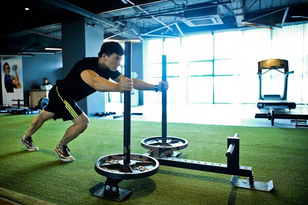 Thảm trải sàn Vạn Bảo thi công hạng mục cỏ nhân tạo phòng Gym